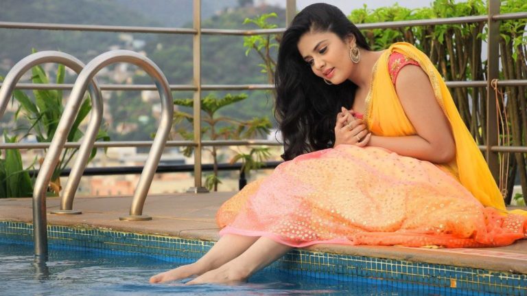Srimukhi in half saree pics