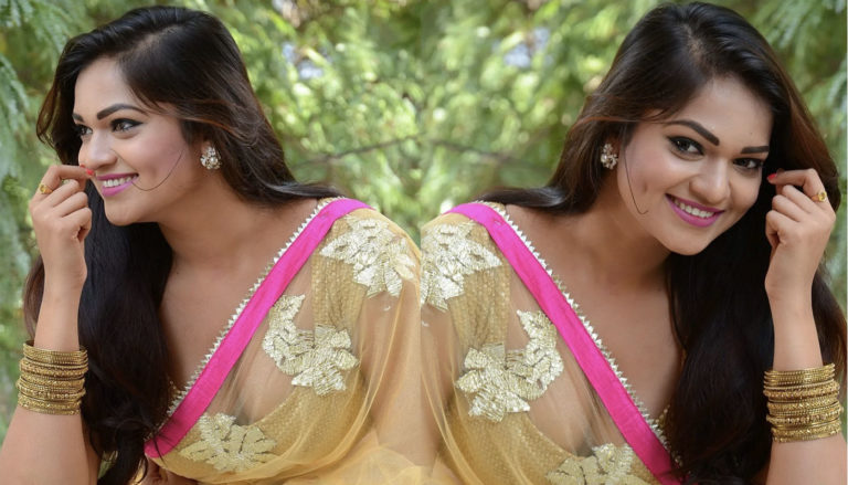 Ashwini hot Cleavage stills in Yellow Saree