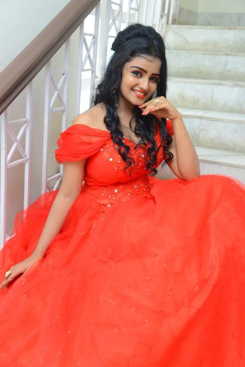 Karronya Katrynn in red gown photos