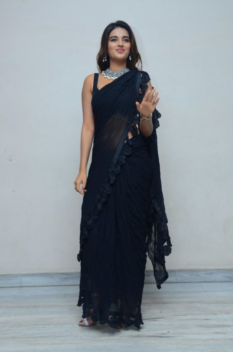 Nidhhi Agerwal in black saree at Ismart Shankar Pre-Release Event