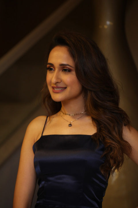 Pragya Jaiswal hot stills in short blue dress at Salon Hair Crush Launch Party