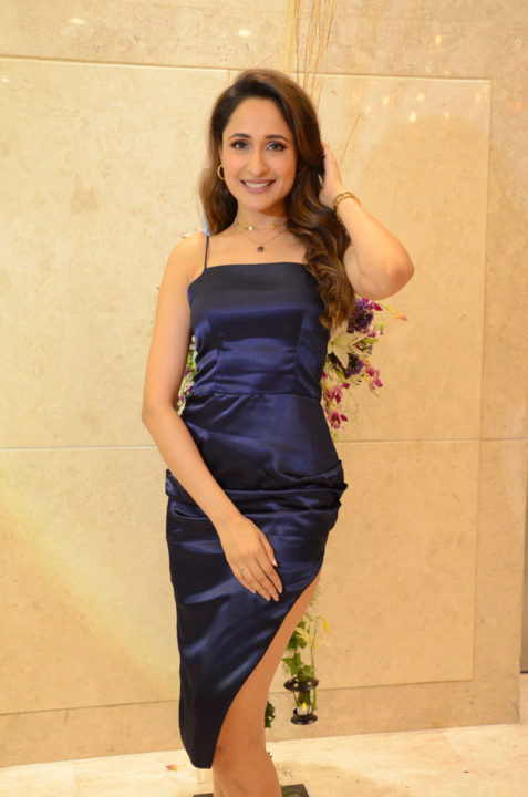 Pragya Jaiswal hot stills in short blue dress at Salon Hair Crush Launch Party