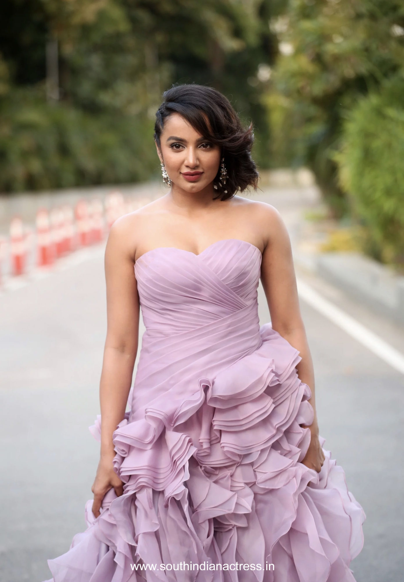 Tejaswi Madivada in purple strapless gown