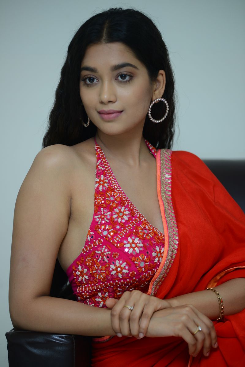 Digangana Suryavanshi in red saree at Valayam movie interview