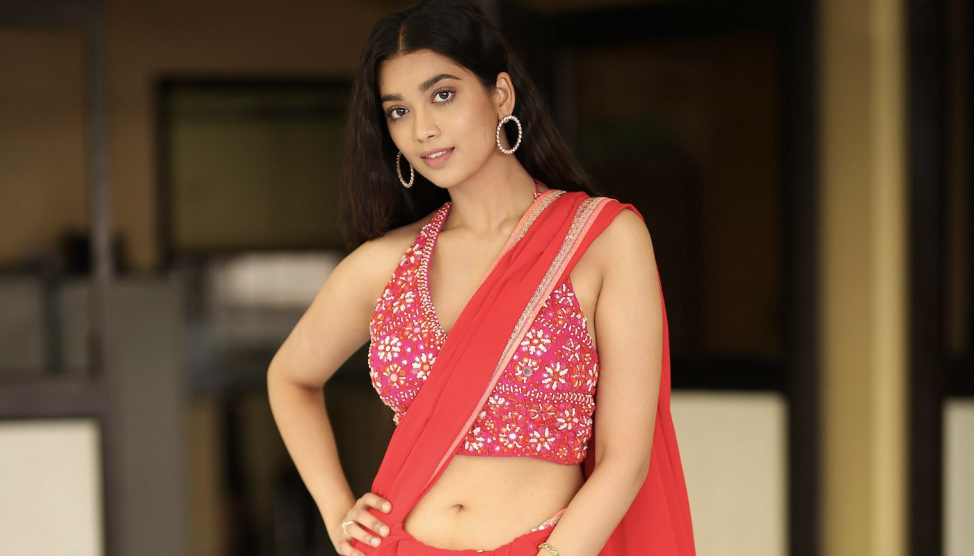 Digangana Suryavanshi in Sizzling red saree at Valayam movie interview