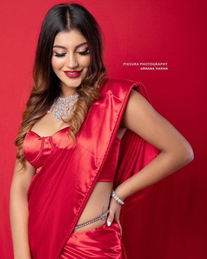 Yashika Aannand hot stills in red saree