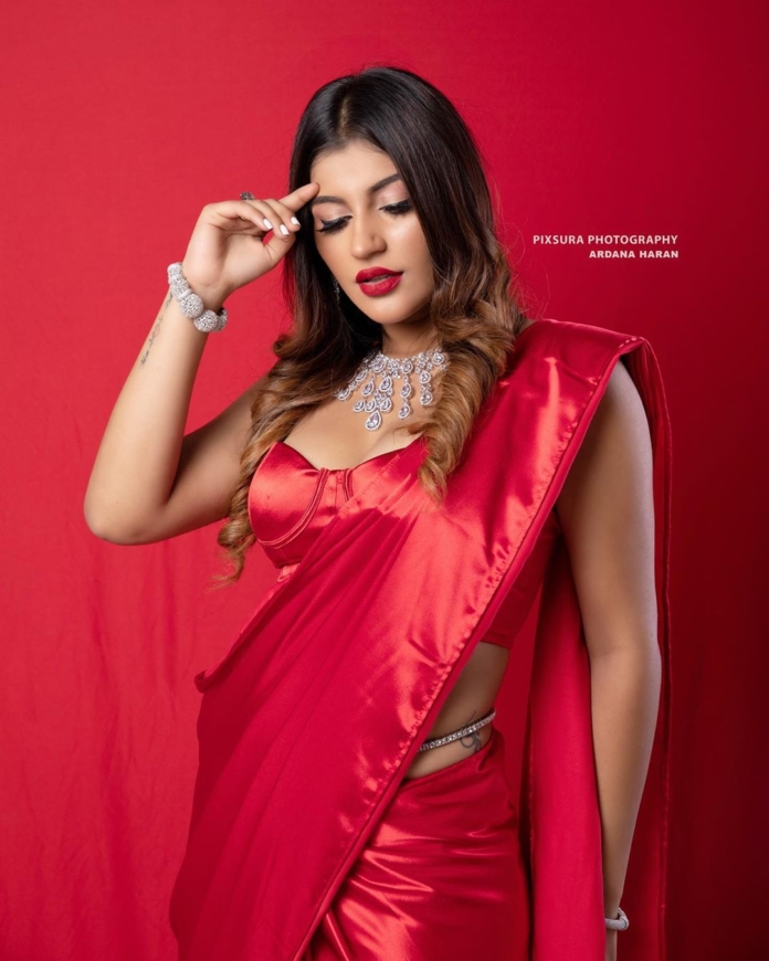 Yashika Aannand hot stills in red saree