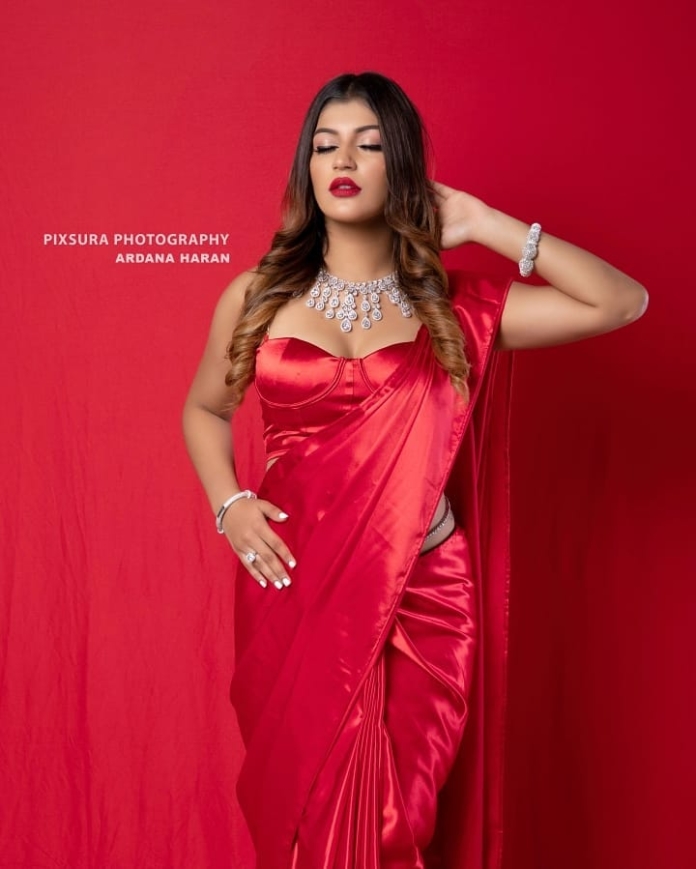 Yashika Aannand hot stills in red saree