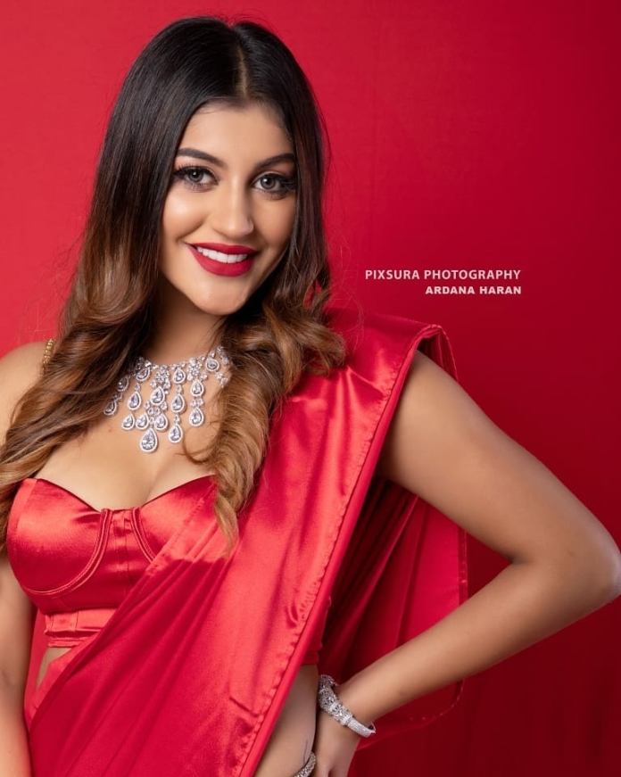 Yashika Aannand hot stills in red saree