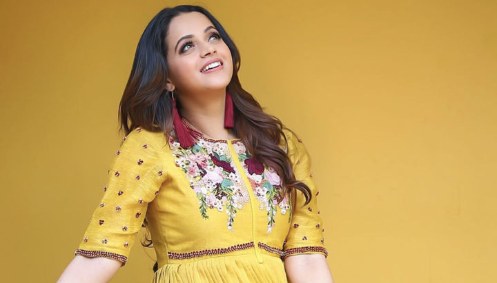 Bhavana beautiful stills in yellow outfit