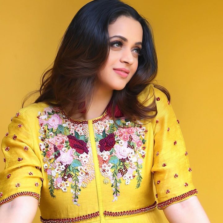 Bhavana beautiful stills in yellow outfit