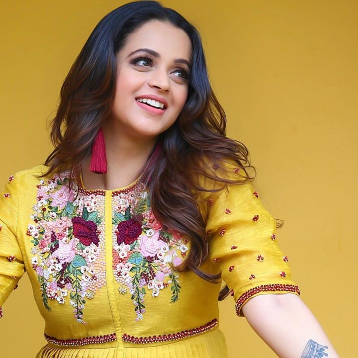 Bhavana beautiful stills in yellow outfit