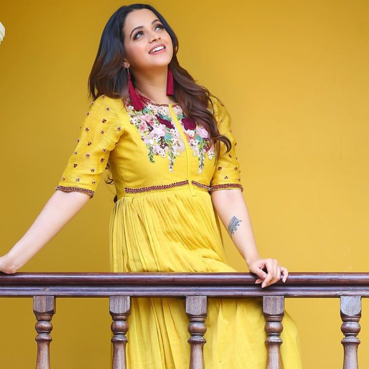 Bhavana beautiful stills in yellow outfit