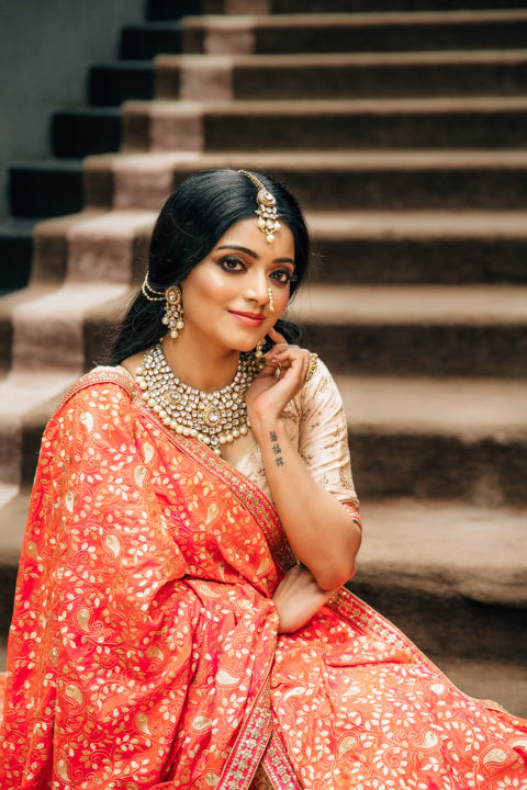 Janani Iyer beautiful stills in bridal wear