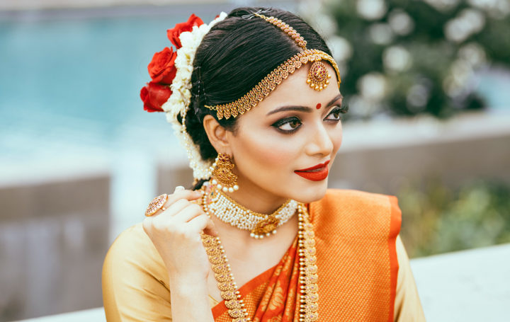 Janani Iyer beautiful stills in bridal wear