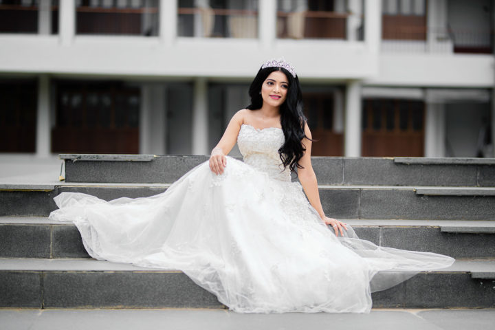 Janani Iyer beautiful stills in wedding gown