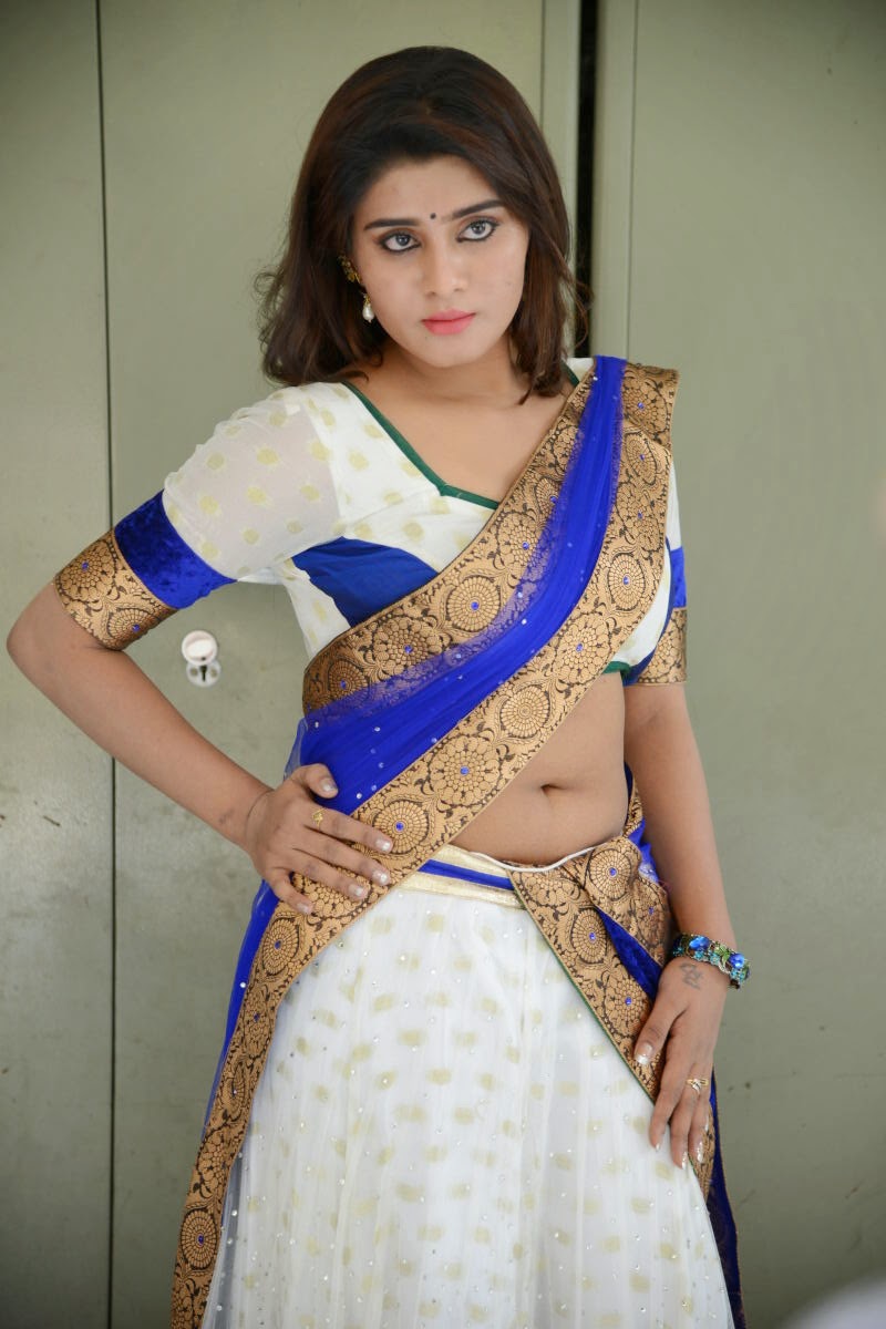 Harini hot navel & cleavage show stills in white saree