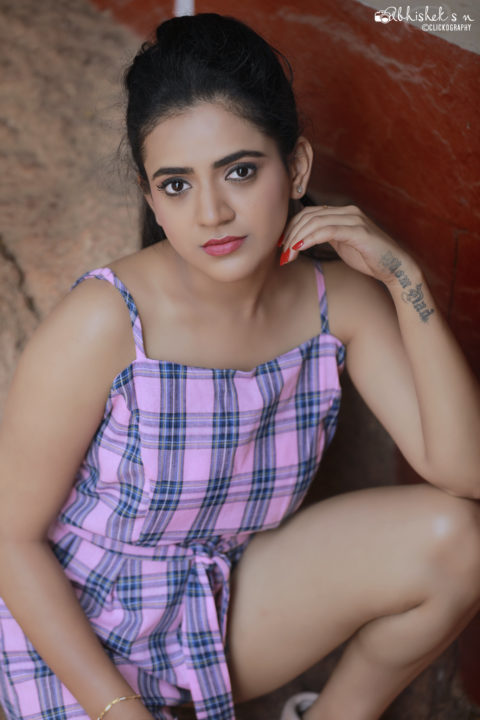 Harshitha Gowda hot stills in pink Playsuit