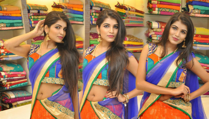 Isha Agarwal in half saree navel stills