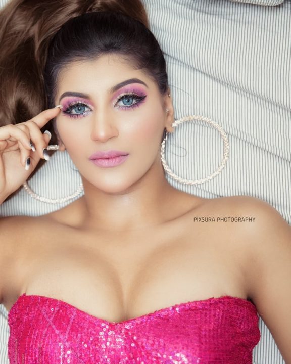 Yashika Aannand hot stills in pink strapless mini dress