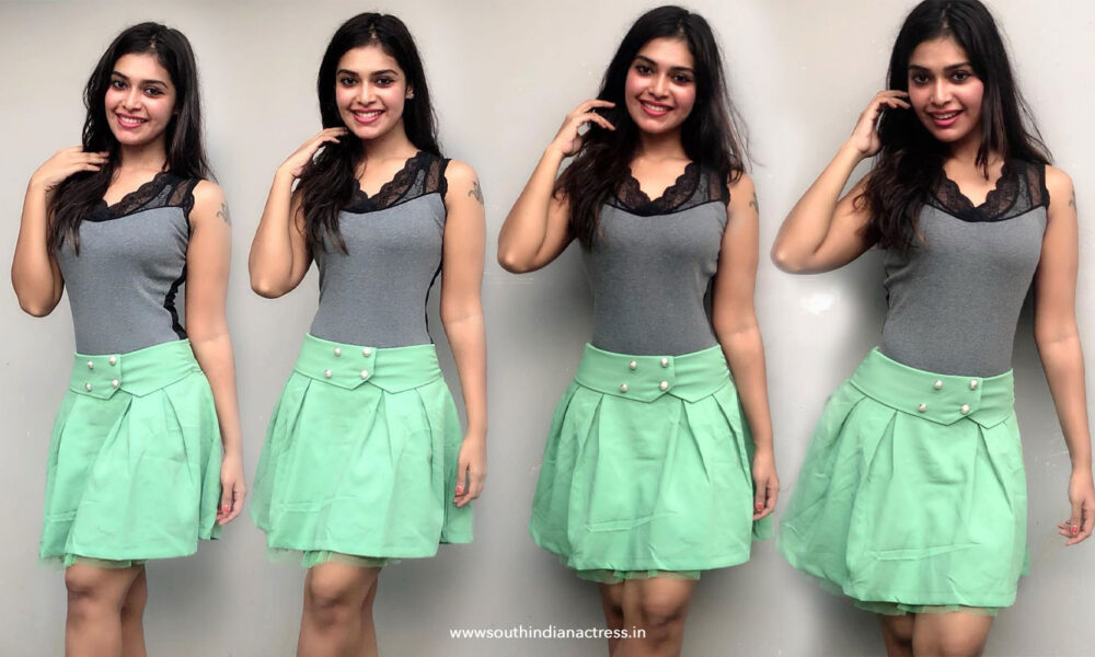 Dharsha Gupta in green short skirt stills