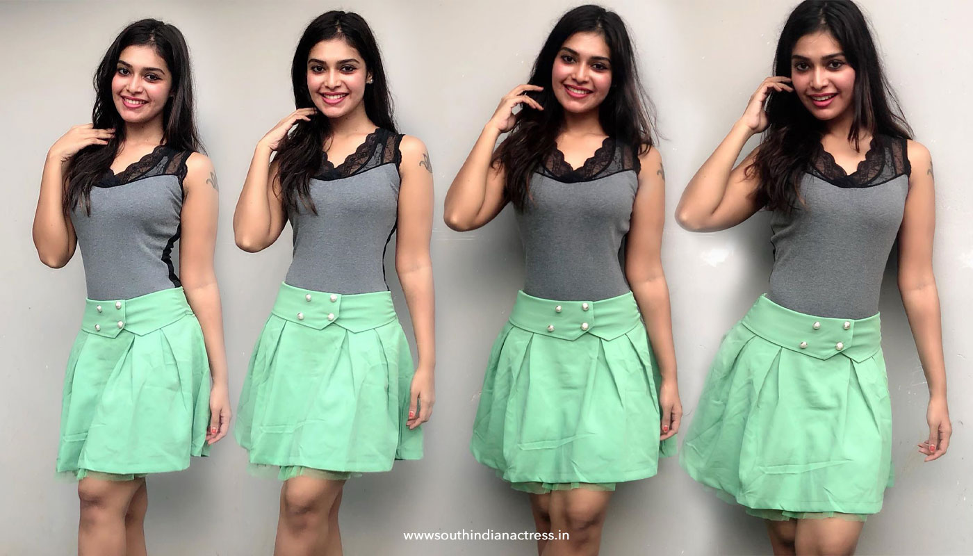 Dharsha Gupta in green short skirt sills