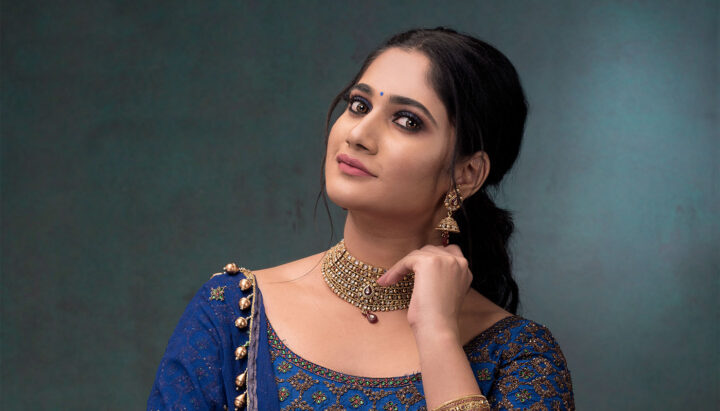 Losliya Mariyanesan stills in blue lehenga