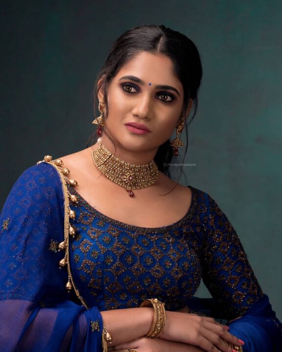 Losliya Mariyanesan stills in blue lehenga