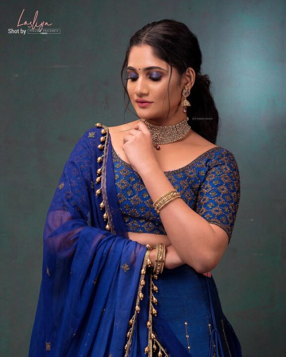 Losliya Mariyanesan stills in blue lehenga