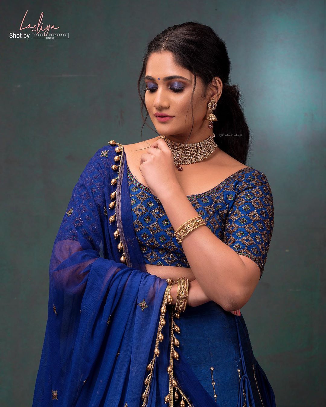 Losliya Mariyanesan stills in blue lehenga - South Indian Actress