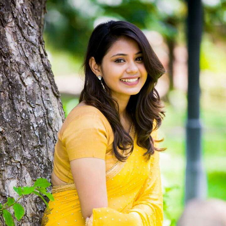 Monica Chinnakotla in yellow saree photos