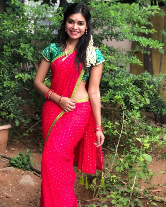 Dharsha Gupta in red saree photos