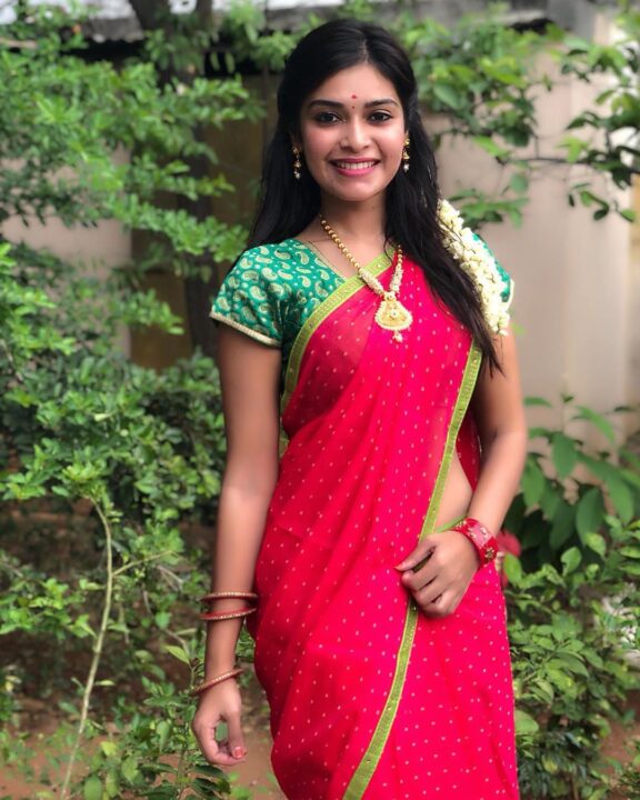 Dharsha Gupta in red saree photos