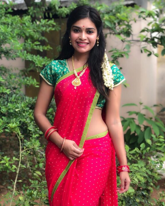 Dharsha Gupta in red saree photos