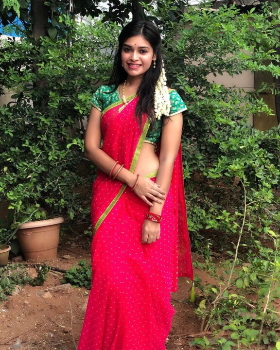 Dharsha Gupta in red saree photos