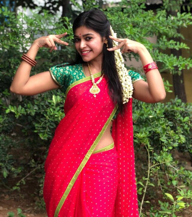 Dharsha Gupta in red saree photos