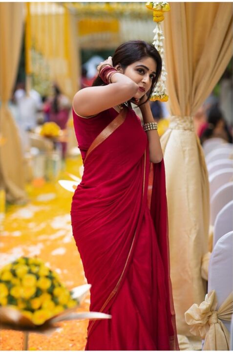 Malayalam television actress Malavika Wales in red saree stills