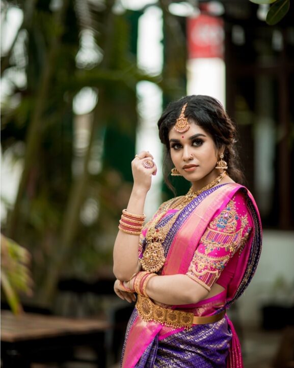 Meenakshi Govindharajan in bridal saree photos