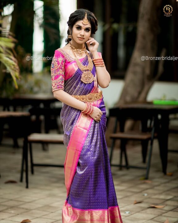 Meenakshi Govindharajan in bridal saree photos