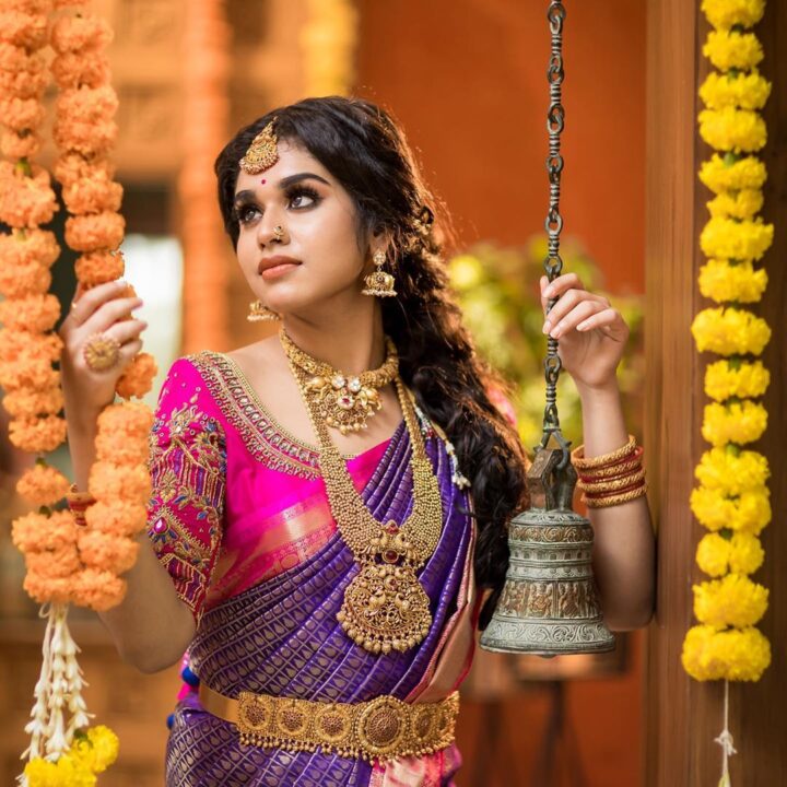 Meenakshi Govindharajan in bridal saree photos