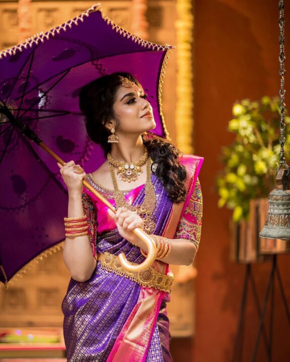 Meenakshi Govindharajan in bridal saree photos