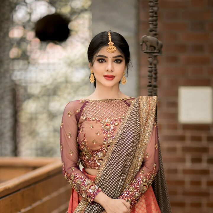 Pavithra Lakshmi in bridal half saree photos