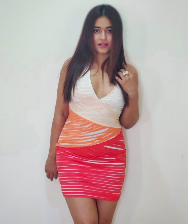 Poonam Bajwa hot stills in short dress