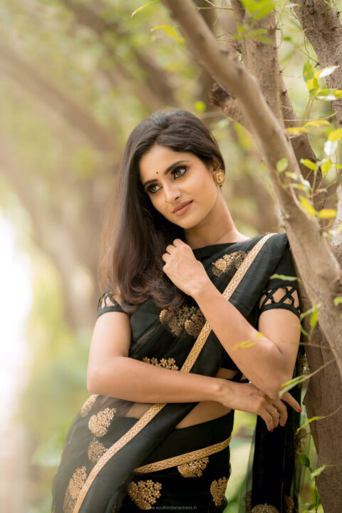 Actress Ayesha beautiful stills in black saree