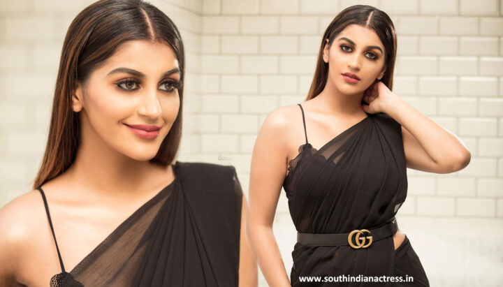 Yashika Aannand stills in belted black saree