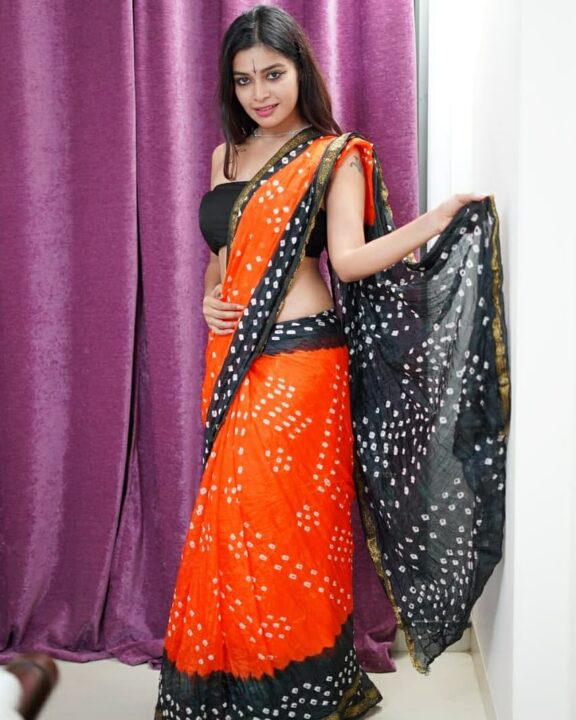 Dharsha Gupta hot stills in strapless blouse and cotton saree