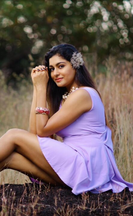 Akshatha Srinivas hot pics in Purple short dress