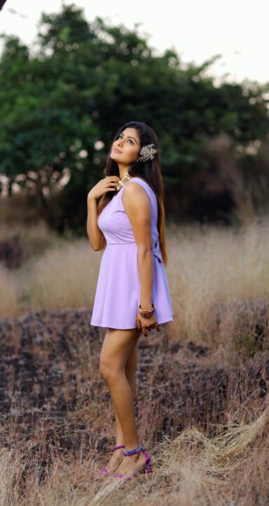 Akshatha Srinivas hot pics in Purple short dress