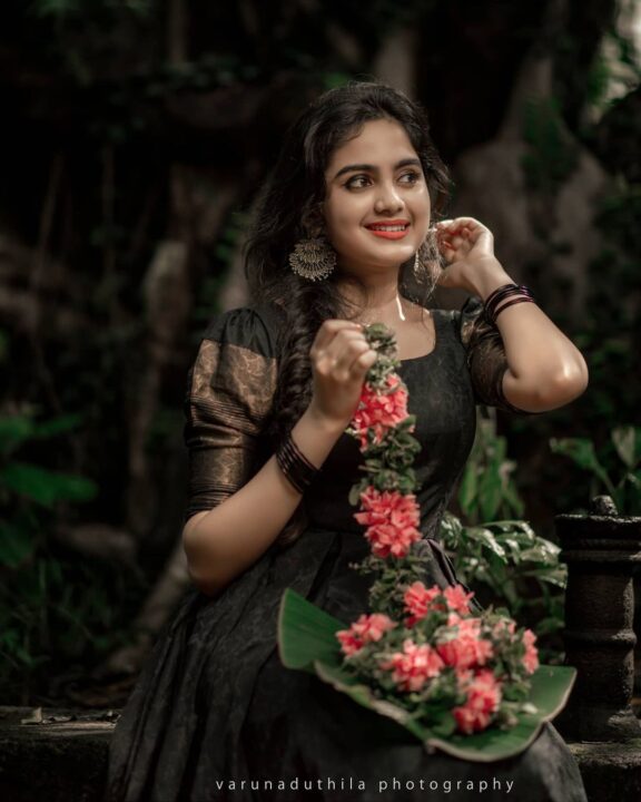 Devika Sanjay stills in black traditional Kerala dress