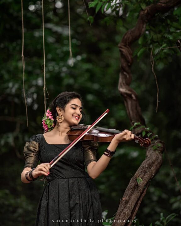 Devika Sanjay stills in black traditional Kerala dress